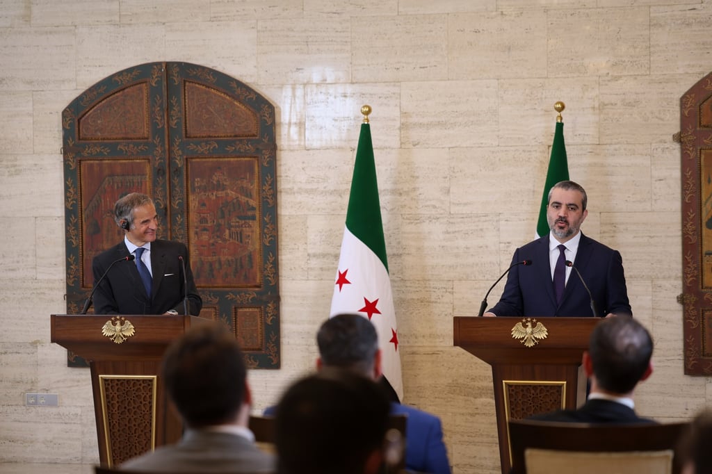 IAEA Director General Rafael Grossi (left) and Syrian Foreign Minister Asaad al-Shibani hold a press conference in Damascus, Syria, in August. Photo: AP
