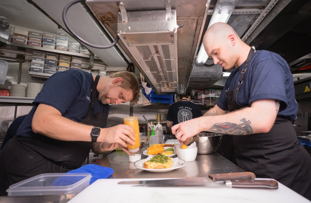 Executive chef Graham Long (left) and head chef Jake Bennett, at work in The Boar’s kitchen. Photo: Alexander Mak