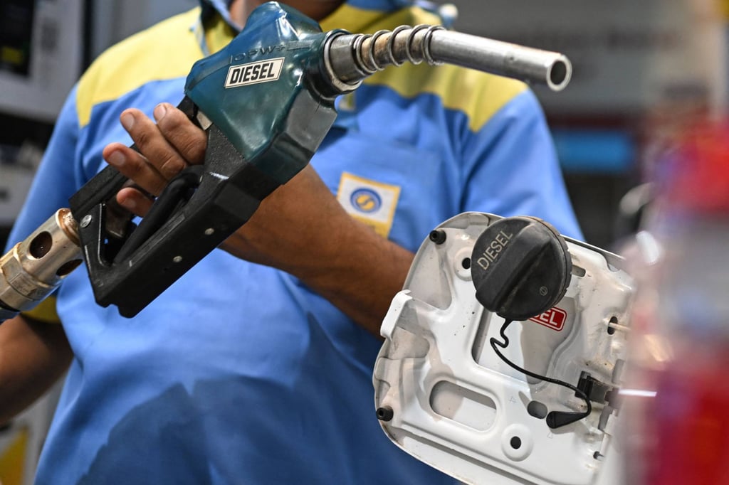 An attendant refuels a vehicle at a Bharat Petroleum petrol station in New Delhi last month. India imports most of its oil and gas. Photo: AFP An attendant refuels a vehicle at a Bharat Petroleum petrol station in New Delhi last month. India imports most of its oil and gas. Photo: AFP