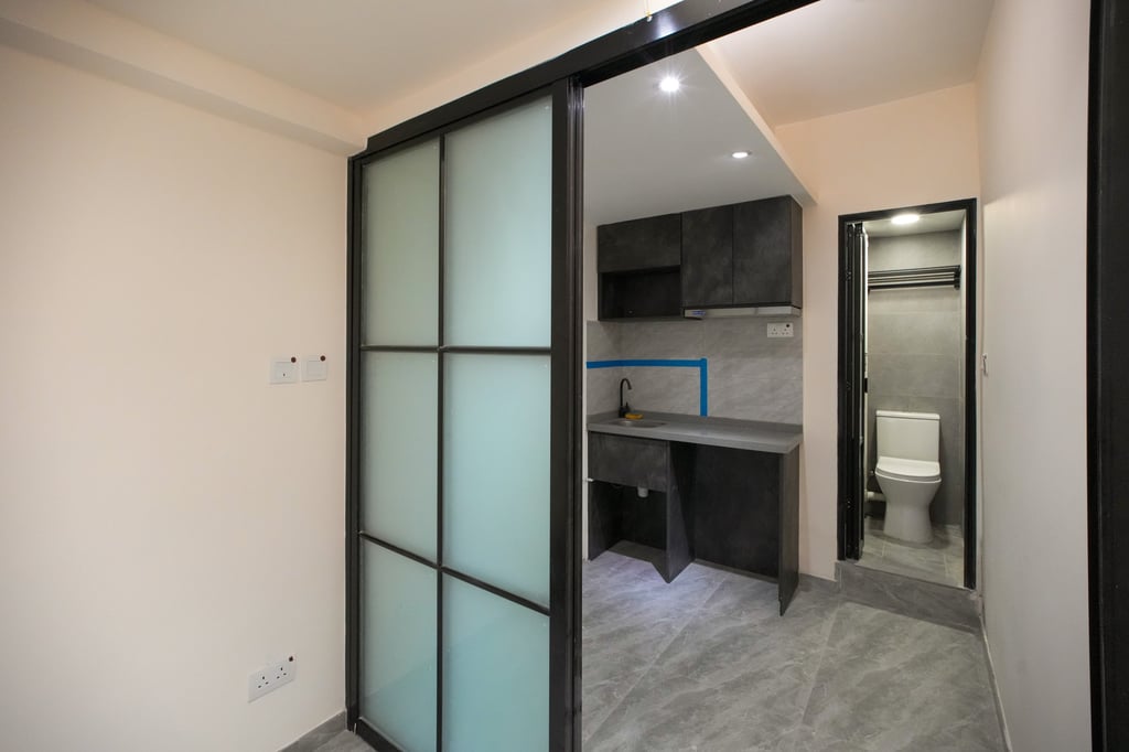 In July, a subdivided flat containing three basic housing units at Tsung Nga Building in Sham Shui Po was the first to be approved under the government’s new regulations. Photo: Dickson Lee