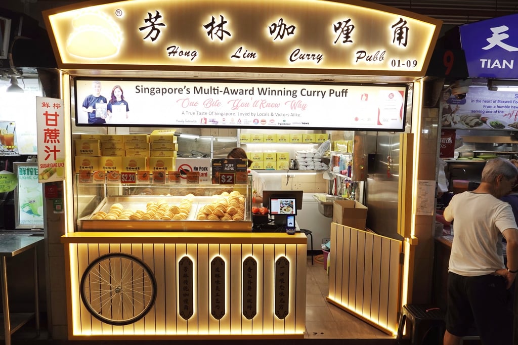 Known for their irresistible crispy texture, Hong Lim Curry Puff at Maxwell Food Centre is a staple of Singaporean culinary heritage. Photo: Shutterstock Known for their irresistible crispy texture, Hong Lim Curry Puff at Maxwell Food Centre is a staple of Singaporean culinary heritage. Photo: Shutterstock