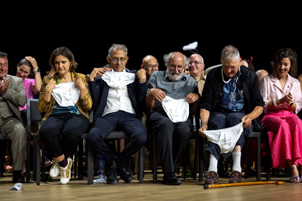 (From left) Nobel Prize winners Esther Duflo, Abhijit Banerjee, Michel Mayor and Tim Hunt look at the underpants handed over by the Soil Science Award Winners during the Ig Nobel Prize ceremony in Zurich on Thursday. Photo: EPA (From left) Nobel Prize winners Esther Duflo, Abhijit Banerjee, Michel Mayor and Tim Hunt look at the underpants handed over by the Soil Science Award Winners during the Ig Nobel Prize ceremony in Zurich on Thursday. Photo: EPA