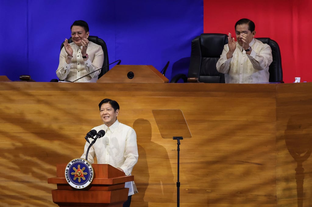 Philippine President Ferdinand Marcos Jnr delivers an address as Senate leader Francis Escudero (left) and House Speaker Martin Romualdez (right) applaud at the House of Representatives in Quezon City in July 2024. Photo: AP Philippine President Ferdinand Marcos Jnr delivers an address as Senate leader Francis Escudero (left) and House Speaker Martin Romualdez (right) applaud at the House of Representatives in Quezon City in July 2024. Photo: AP