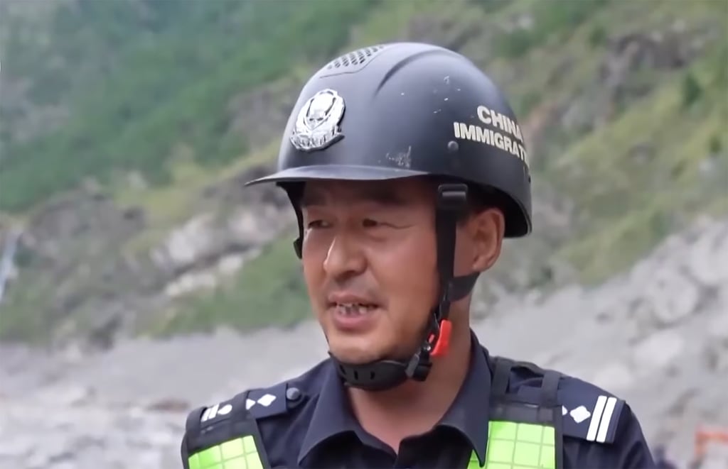Gui Xinwei, deputy chief of the Gyirong Border Inspection Station, who was on leave when the disaster occurred has joined the search for his missing colleagues. Photo: CCTV Gui Xinwei, deputy chief of the Gyirong Border Inspection Station, who was on leave when the disaster occurred has joined the search for his missing colleagues. Photo: CCTV