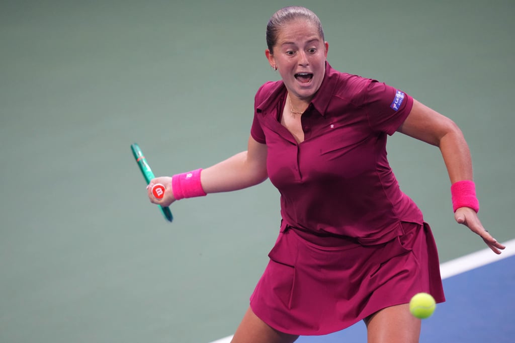 Jelena Ostapenko returns the ball to Tatjana Maria of Germany during the first round of the US Open tennis championships in New York on September 1. Photo: AP Photo