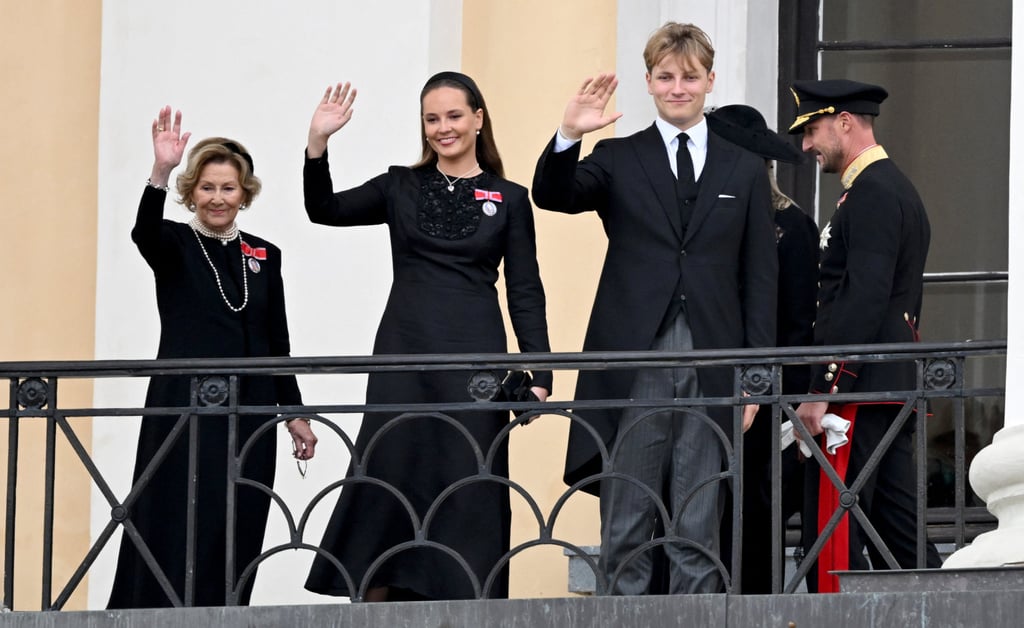 (From left) Queen Sonja of Norway, Crown Princess Ingrid Alexandra, Prince Sverre Magnus and King Haakon VIII are seen on the balcony of the Royal Palace after the funeral of the late King Harald V in Oslo on Wednesday. Photo: AFP
