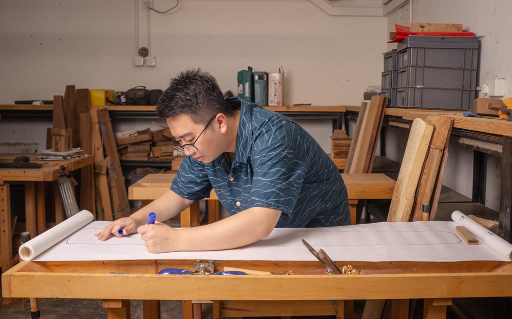 Wan draws a blueprint for the instrument, at the Jockey Club Creative Arts Centre. Photo: Alexander Mak Wan draws a blueprint for the instrument, at the Jockey Club Creative Arts Centre. Photo: Alexander Mak