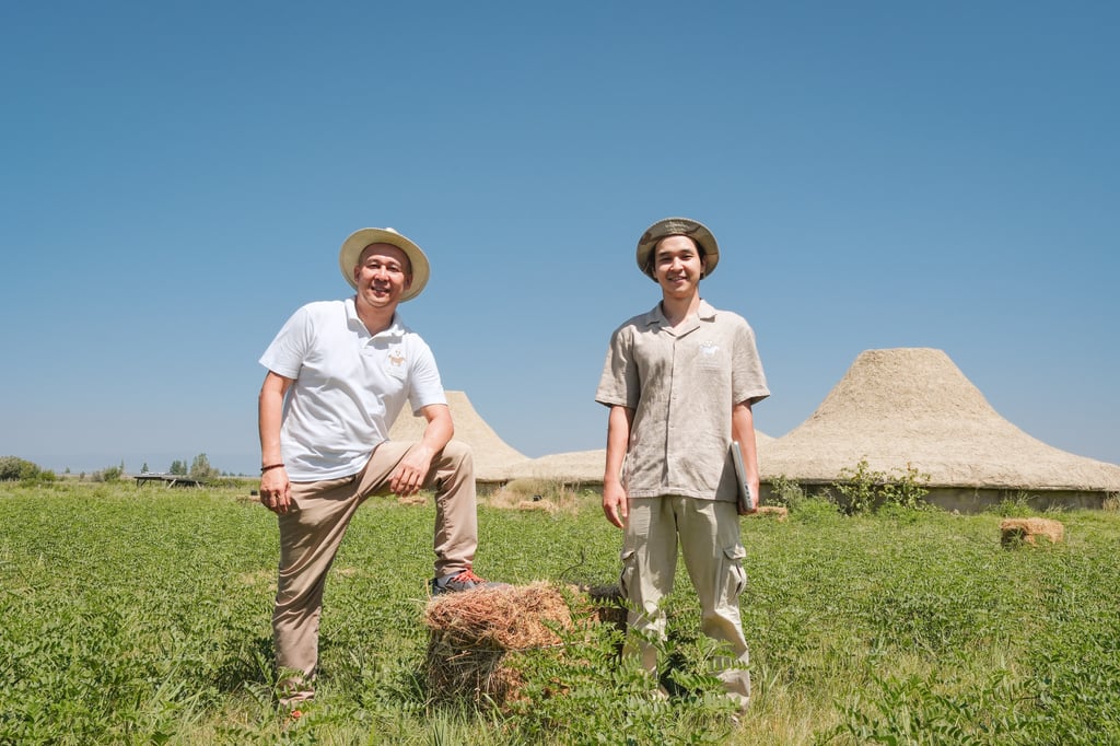 Nurbol (left) and his son Ilyas, in front of their Ush Qiyan Open-Air Museum. Photo: Hei Kiu Au Nurbol (left) and his son Ilyas, in front of their Ush Qiyan Open-Air Museum. Photo: Hei Kiu Au