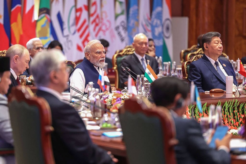 Russia’s President Vladimir Putin (left), India’s Prime Minister Narendra Modi (centre) and China’s President Xi Jinping (right) attend the Brics summit in New Delhi on Sunday. Photo: Indian Press Information Bureau/AFP Russia’s President Vladimir Putin (left), India’s Prime Minister Narendra Modi (centre) and China’s President Xi Jinping (right) attend the Brics summit in New Delhi on Sunday. Photo: Indian Press Information Bureau/AFP