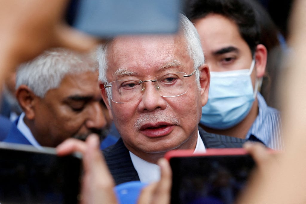 Former Malaysian prime minister Najib Razak speaks to journalists outside the Federal Court in Putrajaya during a court break on August 23, 2022. Photo: Reuters