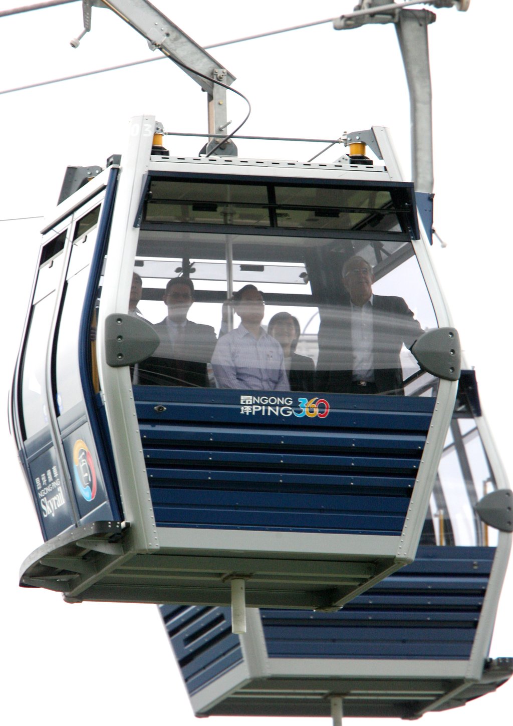 Chief Executive Donald Tsang takes his first ride on Ngong Ping 360 cable car on June 14, 2006. Photo: Martin Chan Chief Executive Donald Tsang takes his first ride on Ngong Ping 360 cable car on June 14, 2006. Photo: Martin Chan