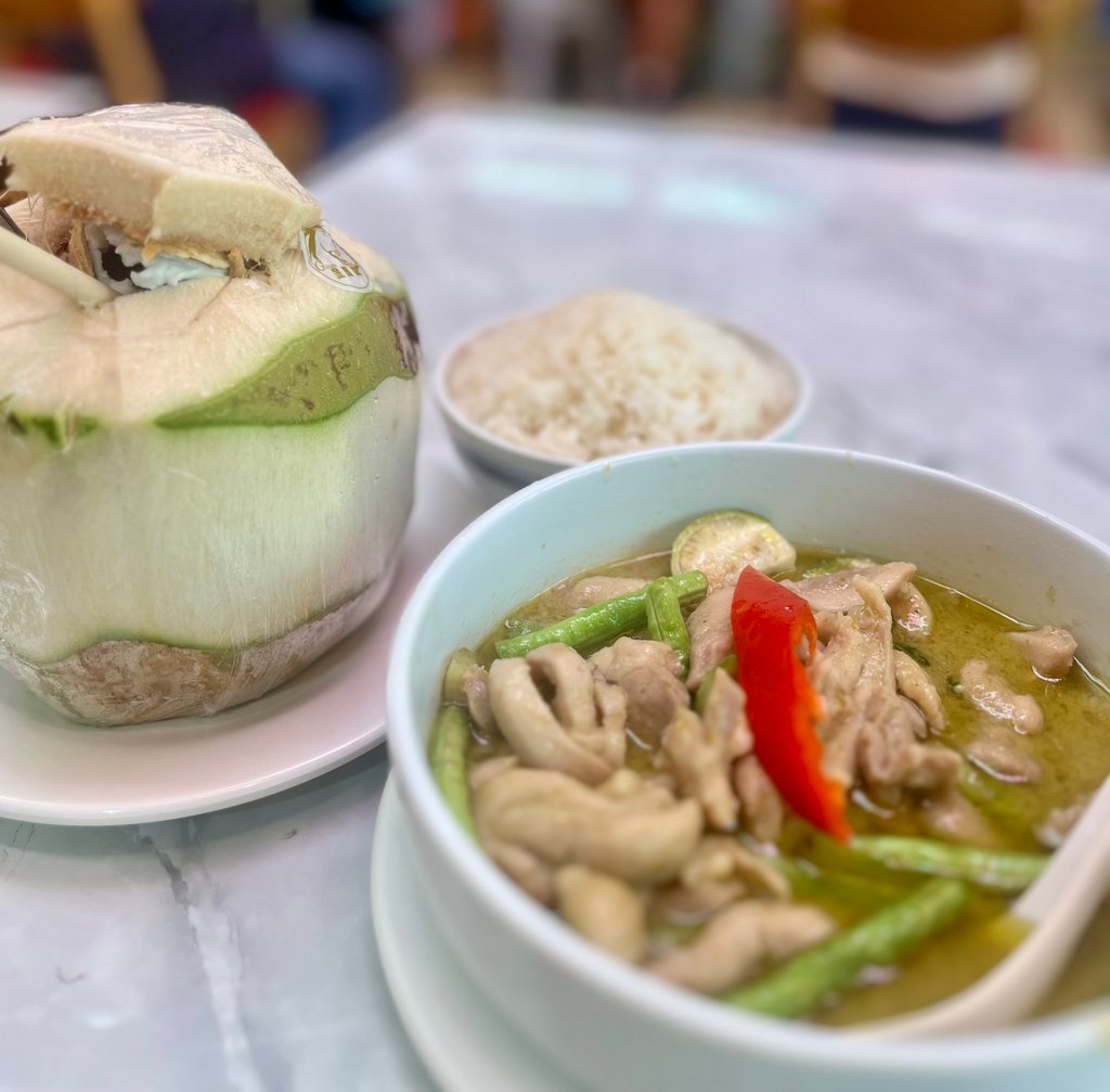 Green chicken curry with rice and a fresh coconut at Amporn Thaifood. Photo: Kylie Knott
