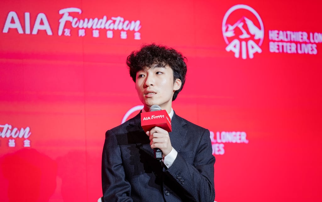 Chan on stage at the AIA Scholarships Ceremony 2025. Photo: courtesy AIA