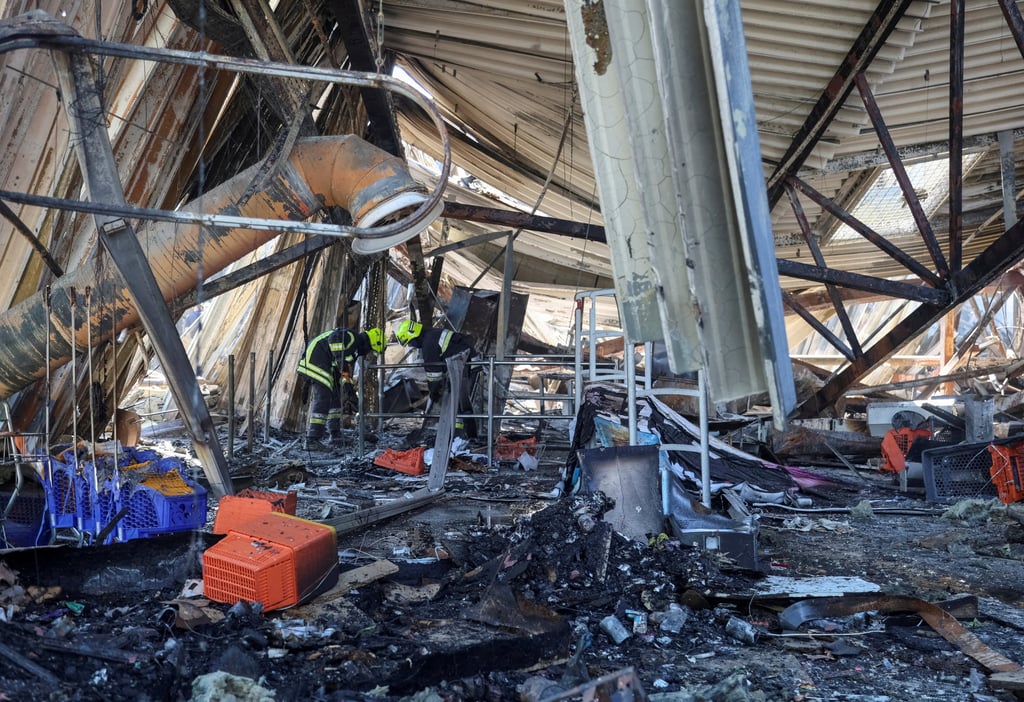 Rescuers work at a site of a shopping centre destroyed by a Russian drone attack in the Ukrainian city of Kryvyi Rih last month. Photo: Reuters