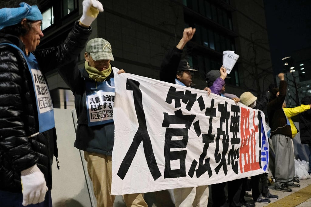 Protesters gather outside parliament in Tokyo in December 2018, opposing legislation to increase foreign worker visas in Japan. Photo: AFP Protesters gather outside parliament in Tokyo in December 2018, opposing legislation to increase foreign worker visas in Japan. Photo: AFP