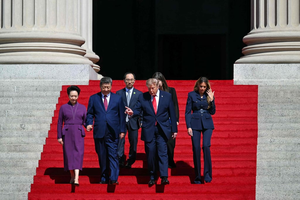 US President Donald Trump, First Lady Melania Trump, China’s President Xi Jinping and his wife, Peng Liyuan, walk down the steps after a visit to the National Archives in Washington, DC on Saturday. Photo: AFP US President Donald Trump, First Lady Melania Trump, China’s President Xi Jinping and his wife, Peng Liyuan, walk down the steps after a visit to the National Archives in Washington, DC on Saturday. Photo: AFP