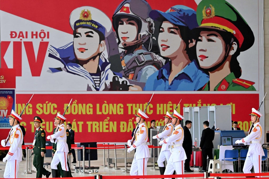 Honour guards walk past a billboard advertising the 14th National Congress of the Communist Party of Vietnam in Hanoi in January. Photo: AFP Honour guards walk past a billboard advertising the 14th National Congress of the Communist Party of Vietnam in Hanoi in January. Photo: AFP