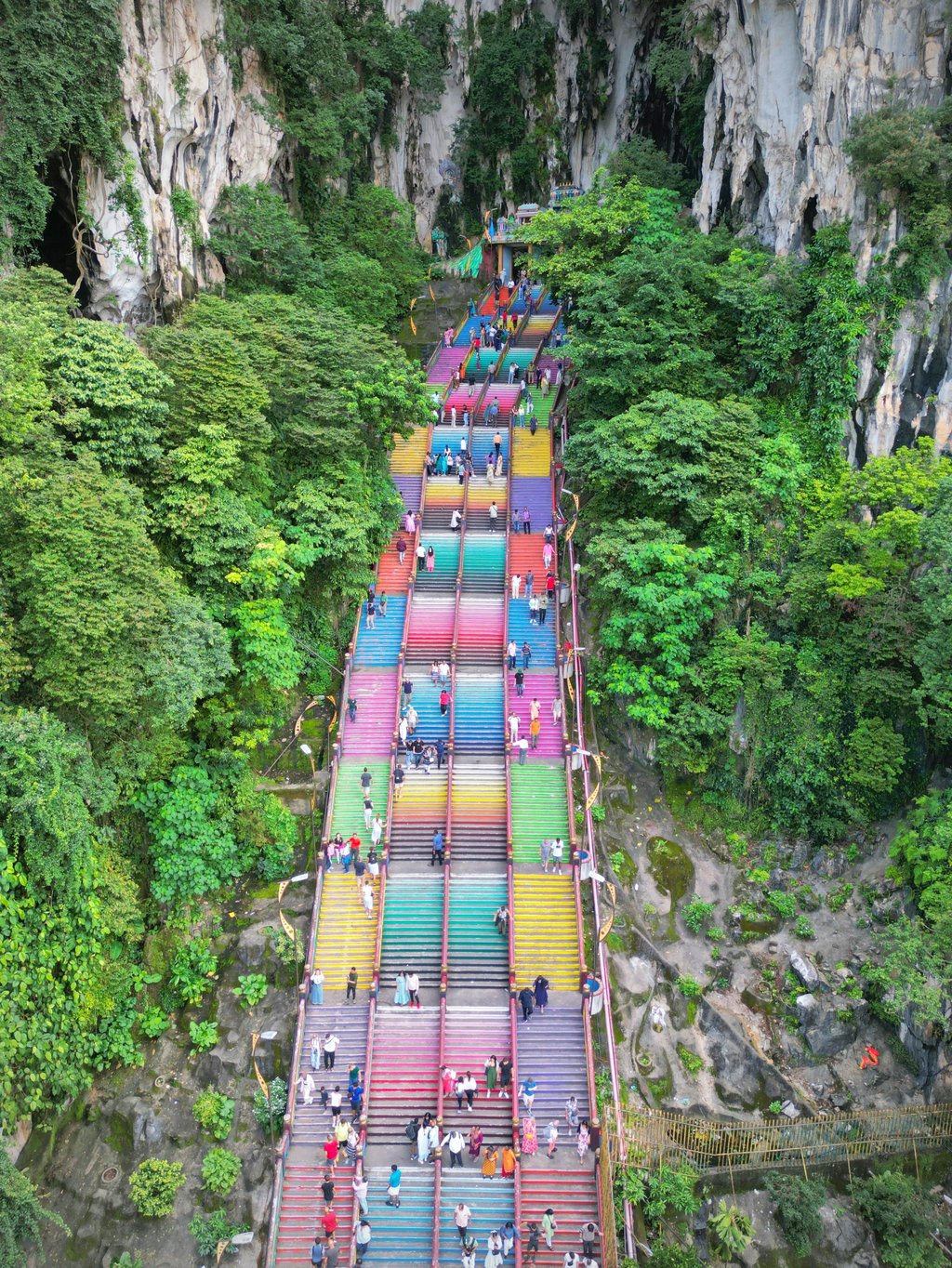 Visitors to Kuala Lumpur often join Hindu pilgrims by travelling outside the capital to climb the colourful staircase to the limestone cave temples at Batu Caves. Photo: Shutterstock