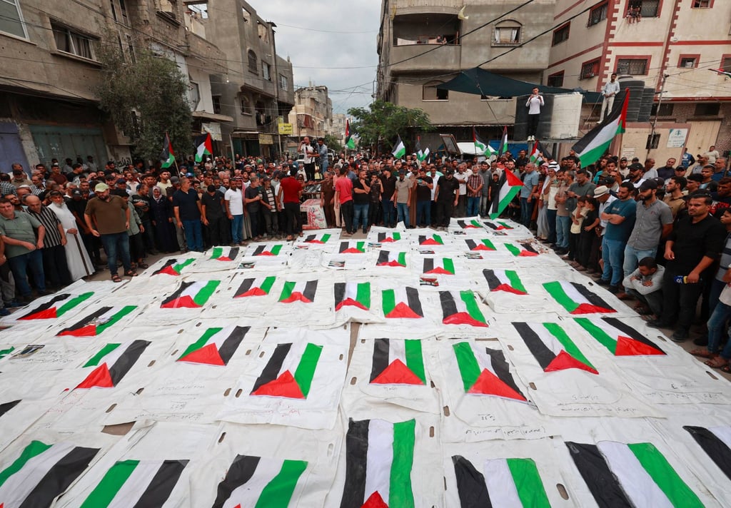 A mass funeral held at the Nuseirat refugee camp in the central Gaza Strip on Tuesday after the recovery of 41 bodies from the rubble of a building hit in an Israeli strike at the start of the war in October 2023. Photo: AFP A mass funeral held at the Nuseirat refugee camp in the central Gaza Strip on Tuesday after the recovery of 41 bodies from the rubble of a building hit in an Israeli strike at the start of the war in October 2023. Photo: AFP