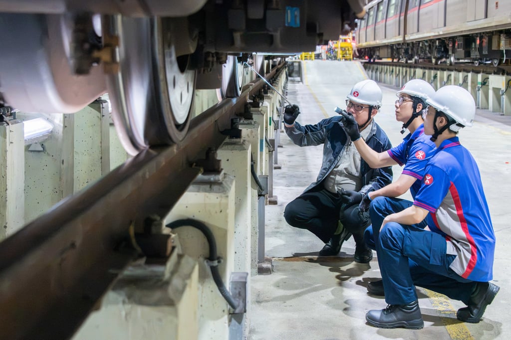 Gordon Tang (middle), an employee under the MTR Corporation’s railway technical trainee scheme, underwent an additional 18 months of training to prepare for the competition. Photo: MTR Corp