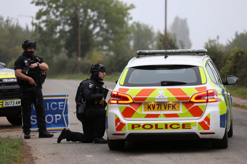 Police officers guard an area as roadblocks remain in place near RAF Fairford airbase on Tuesday. Photo: Reuters Police officers guard an area as roadblocks remain in place near RAF Fairford airbase on Tuesday. Photo: Reuters