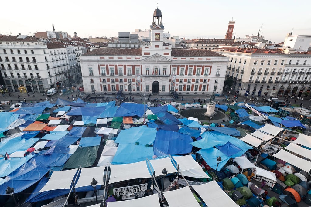 An aerial view shows tents at a housing protest encampment at Puerta del Sol in Madrid, Spain, on Tuesday. Photo: EPA