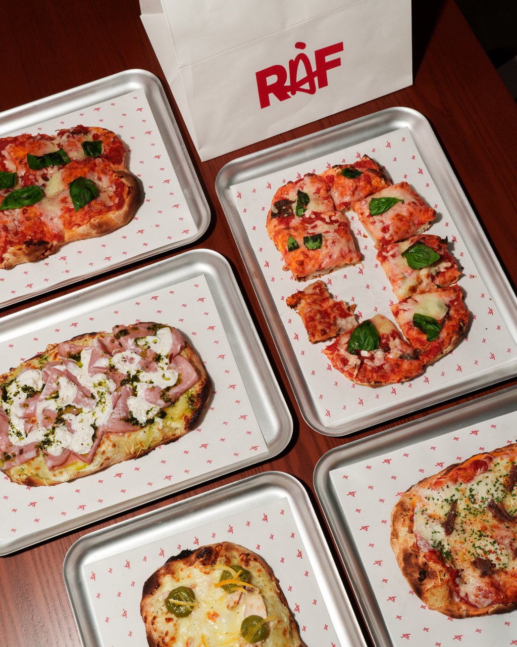 Rome-style flatbread pizzas (known as pinzas) from Raf by Roucou in Wan Chai. Photo: Raf by Roucou