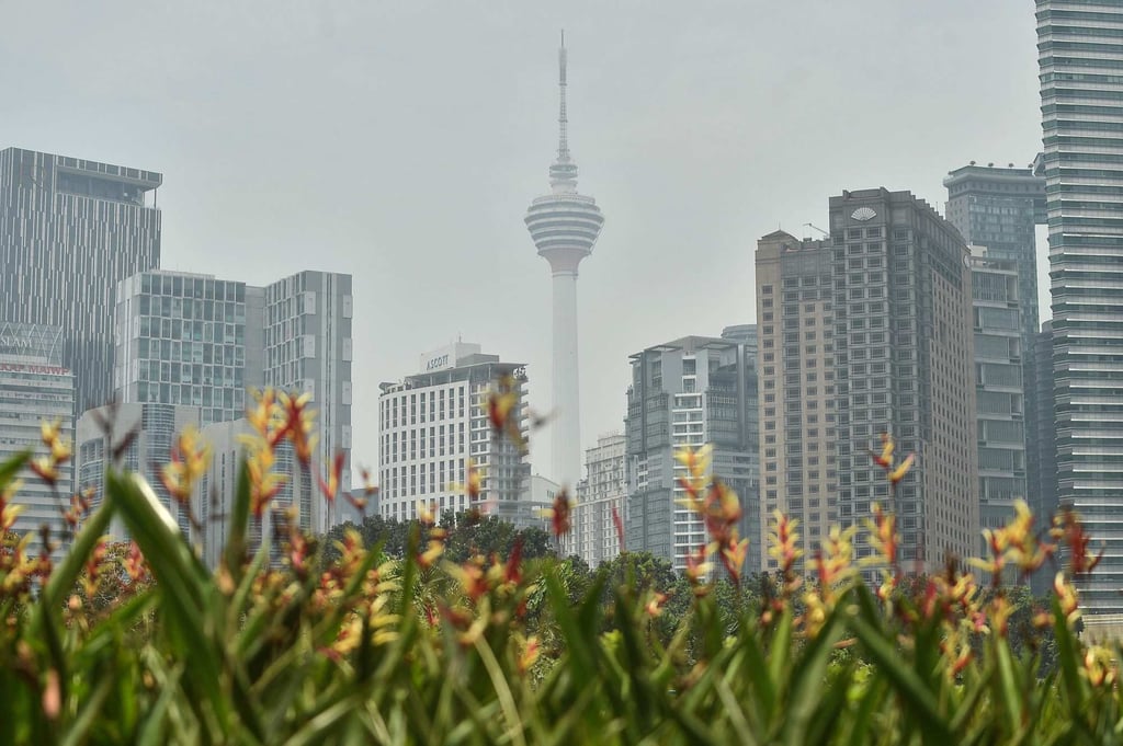 The KL Tower (centre) and other buildings are seen shrouded by haze in Kuala Lumpur on September 21. Photo: AFP The KL Tower (centre) and other buildings are seen shrouded by haze in Kuala Lumpur on September 21. Photo: AFP