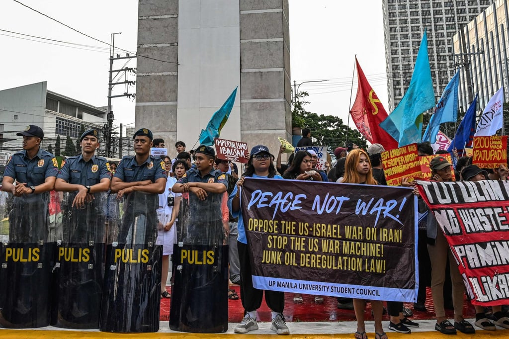 Jeepney drivers and various groups gather along a street to protest against high fuel prices in Manila on Wednesday. Photo: AFP Jeepney drivers and various groups gather along a street to protest against high fuel prices in Manila on Wednesday. Photo: AFP