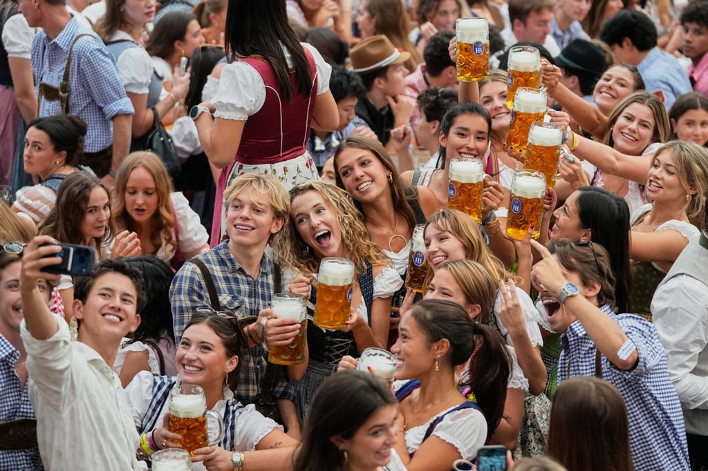 People cheer after the opening of the 191st Oktoberfest in Munich, Germany, on September 19, 2026. Photo: AP People cheer after the opening of the 191st Oktoberfest in Munich, Germany, on September 19, 2026. Photo: AP