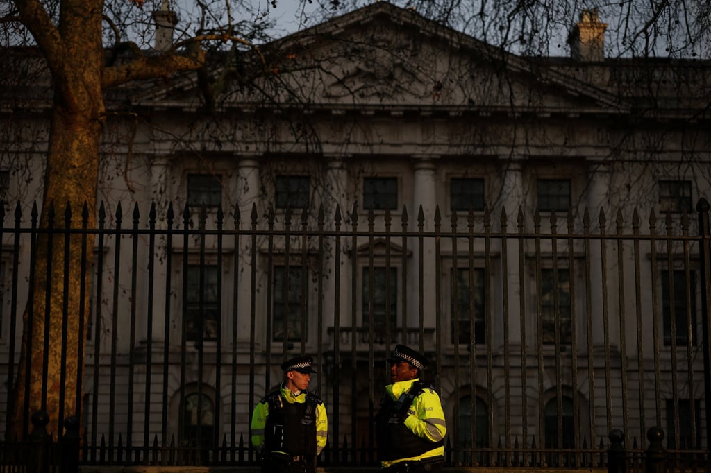 Police stand outside Royal Mint Court, the proposed site of a new Chinese embassy in London, in January. Photo: Reuters