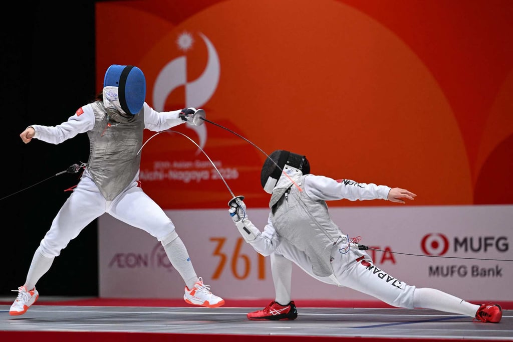 Hong Kong’s Janelle Leung Ya-lei (left) in action against Japan’s Yuka Ueno during the women’s foil team semi-final event at the 2026 Asian Games at Aichi Sky Expo, in Aichi prefecture, on September 26, 2026. Photo: AFP