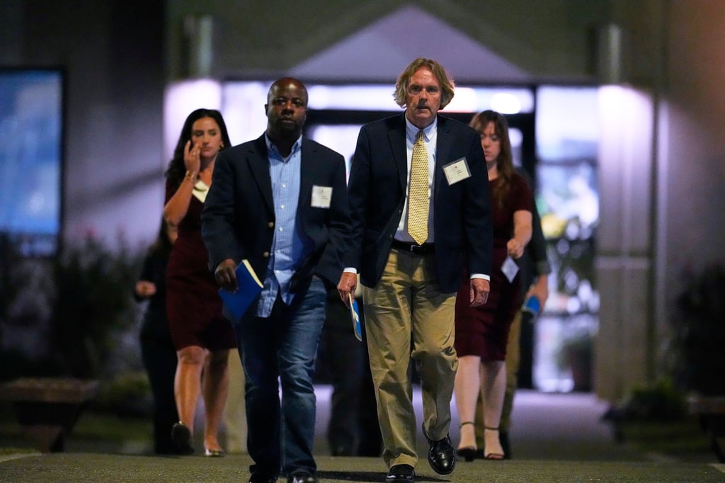 Media witnesses leave Riverbend Maximum Security Institution after the execution of Christa Pike was halted. Photo: AP