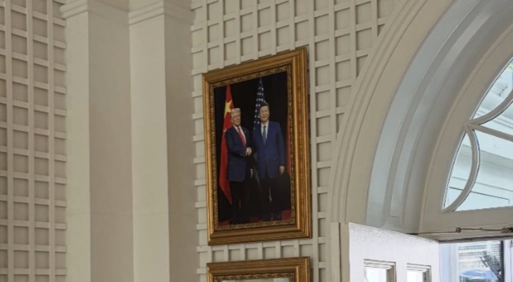 A photograph of Xi standing side by side with Trump that features on the White House wall. Photo: Handout