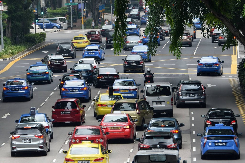 Motorists drive into Singapore’s central business district. Roads take up 12 per cent of the city state’s land area. Photo: AFP