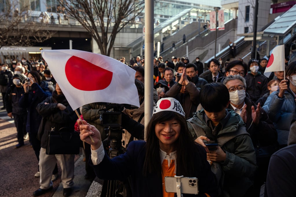 People attend a campaign event for Japan’s far-right Sanseito party in Tokyo, in January. Photo: AP