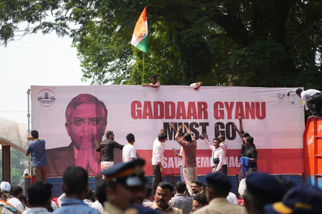Supporters of the Cockroach Janta Party shout slogans during a protest calling for the suspension of revised electoral rolls in Mumbai on Friday. Photo: AP Supporters of the Cockroach Janta Party shout slogans during a protest calling for the suspension of revised electoral rolls in Mumbai on Friday. Photo: AP