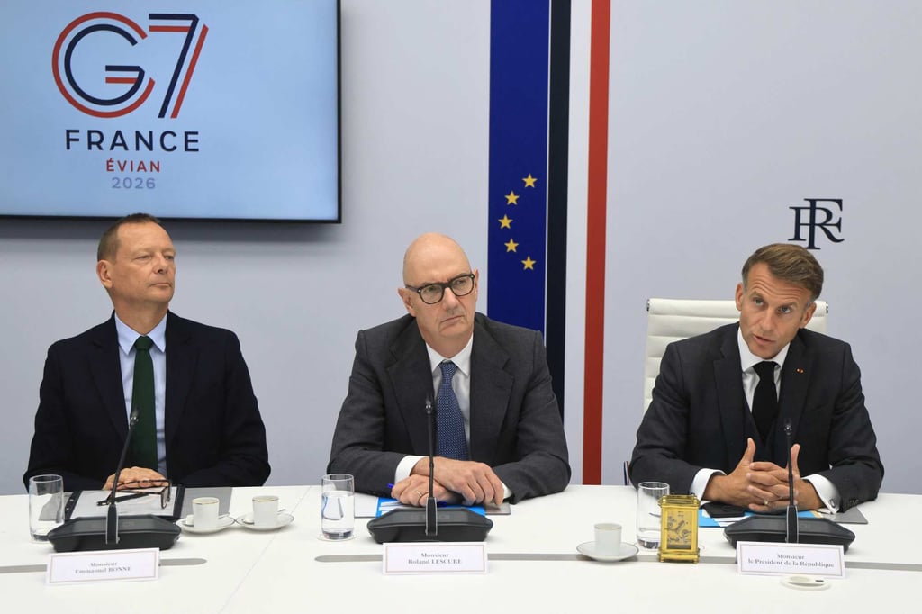 French President Emmanuel Macron (right) speaks next to French Presidential adviser Emmanuel Bonne (left) and France’s Economy, Finances and Industry Minister Roland Lescure following a videoconference with G7 leaders in Paris on Friday. Photo: AFP French President Emmanuel Macron (right) speaks next to French Presidential adviser Emmanuel Bonne (left) and France’s Economy, Finances and Industry Minister Roland Lescure following a videoconference with G7 leaders in Paris on Friday. Photo: AFP