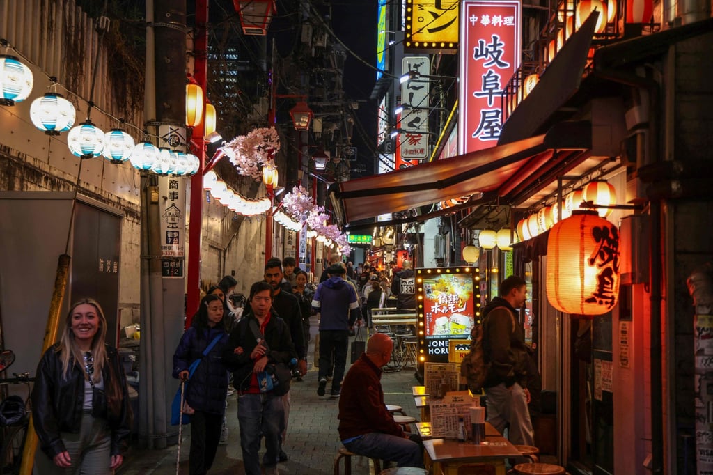 A row of izakaya restaurants in the Shinjuku district in Tokyo. Photo: AFP A row of izakaya restaurants in the Shinjuku district in Tokyo. Photo: AFP