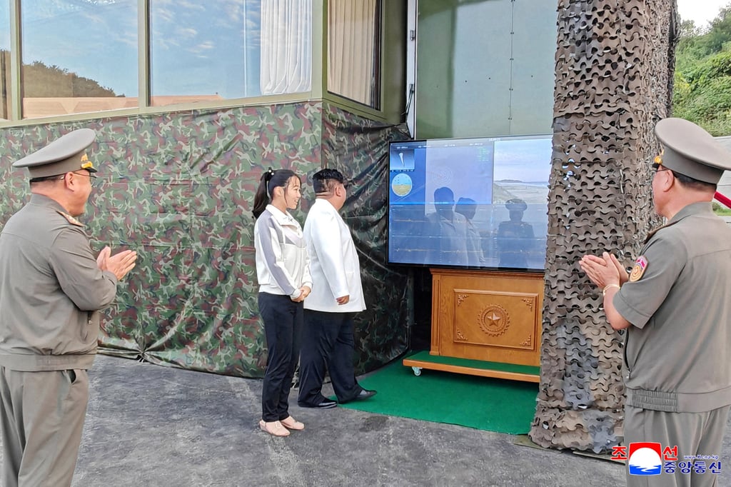 North Korean leader Kim Jong-un, accompanied by his daughter Kim Ju-ae, attends a test of a new type of weapon at an undisclosed location in North Korea on September 20. Photo: KCNA via Reuters North Korean leader Kim Jong-un, accompanied by his daughter Kim Ju-ae, attends a test of a new type of weapon at an undisclosed location in North Korea on September 20. Photo: KCNA via Reuters