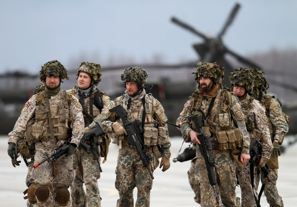 Latvian soldiers take part in an exercise involving Nato troops at the Lielvarde Airbase, Latvia, in 2019. Photo: EPA-EFE Latvian soldiers take part in an exercise involving Nato troops at the Lielvarde Airbase, Latvia, in 2019. Photo: EPA-EFE