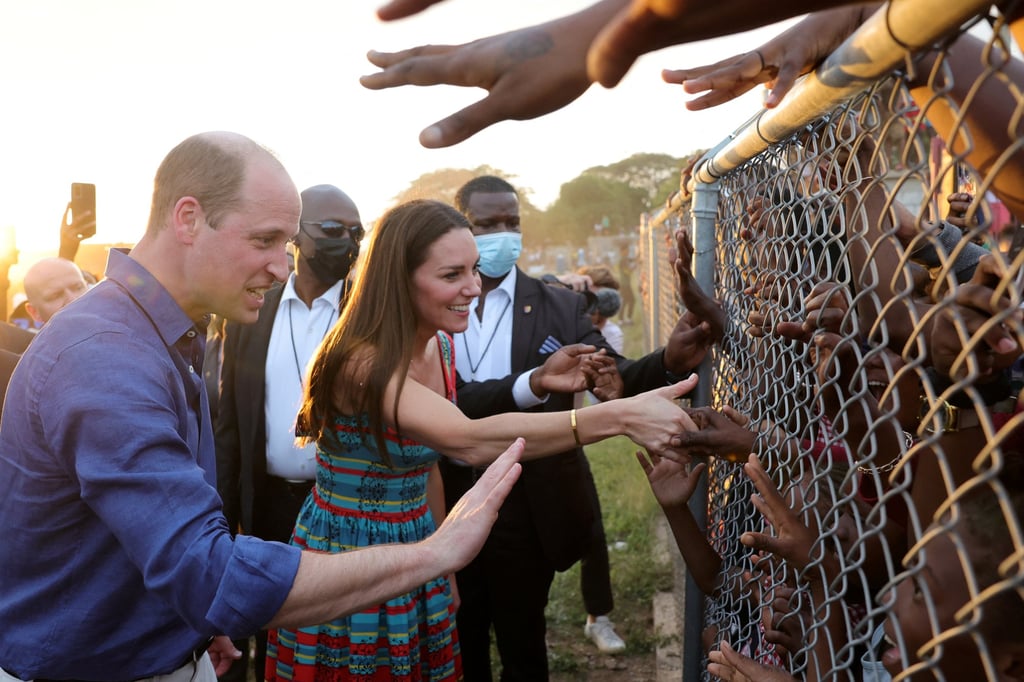Prince William and Catherine, Duchess of Cambridge, shake hands with children during a visit to Trench Town in Kingston, Jamaica, in March 2022. Photo: Reuters Prince William and Catherine, Duchess of Cambridge, shake hands with children during a visit to Trench Town in Kingston, Jamaica, in March 2022. Photo: Reuters