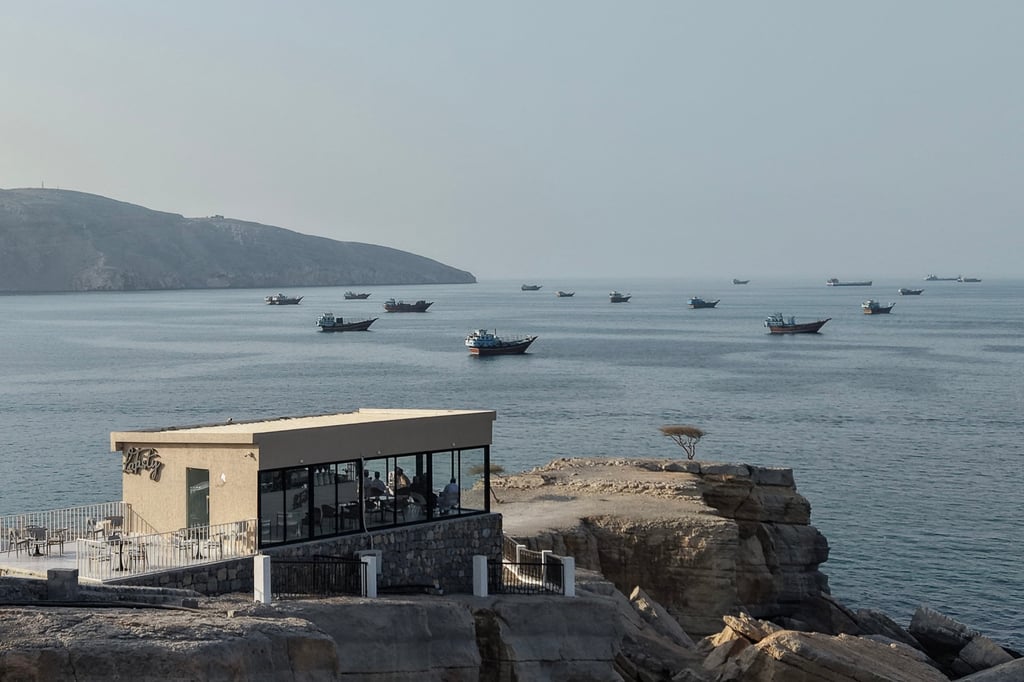 Ships anchored off the coast of Khasab in Oman, near the Strait of Hormuz on Friday. Photo: AFP / Getty Images / TNS
