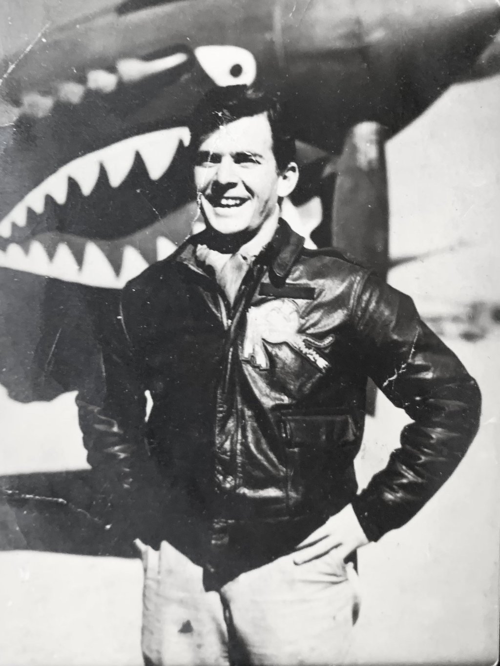 US Army Air Forces First Lieutenant Morton Sher, a 76th Fighter Squadron pilot, poses in front of his P-40 Warhawk in China. Photo: US Department of Defense