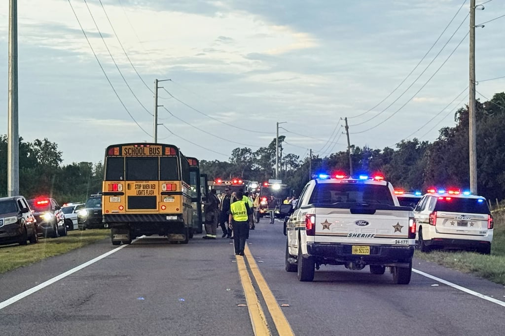 Emergency personnel respond to an accident involving a school bus in Winter Haven, Florida, on Monday. Photo: Polk County Sheriff’s Office via AP