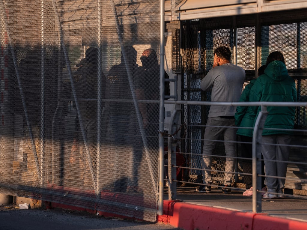 Undocumented migrants are deported to Mexico by US Immigration and Customs Enforcement agents in McAllen, Texas, on March 13. Photo: AP