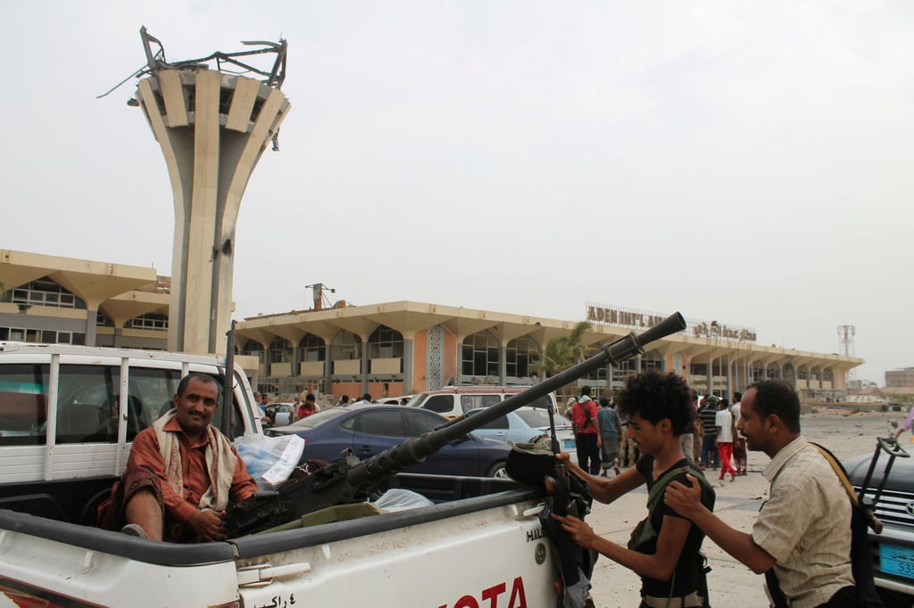 Houthis gather in front of Aden International Airport in Yemen in July 2015. The airport is the main international gateway for parts of Yemen outside Houthi control. Photo: AP