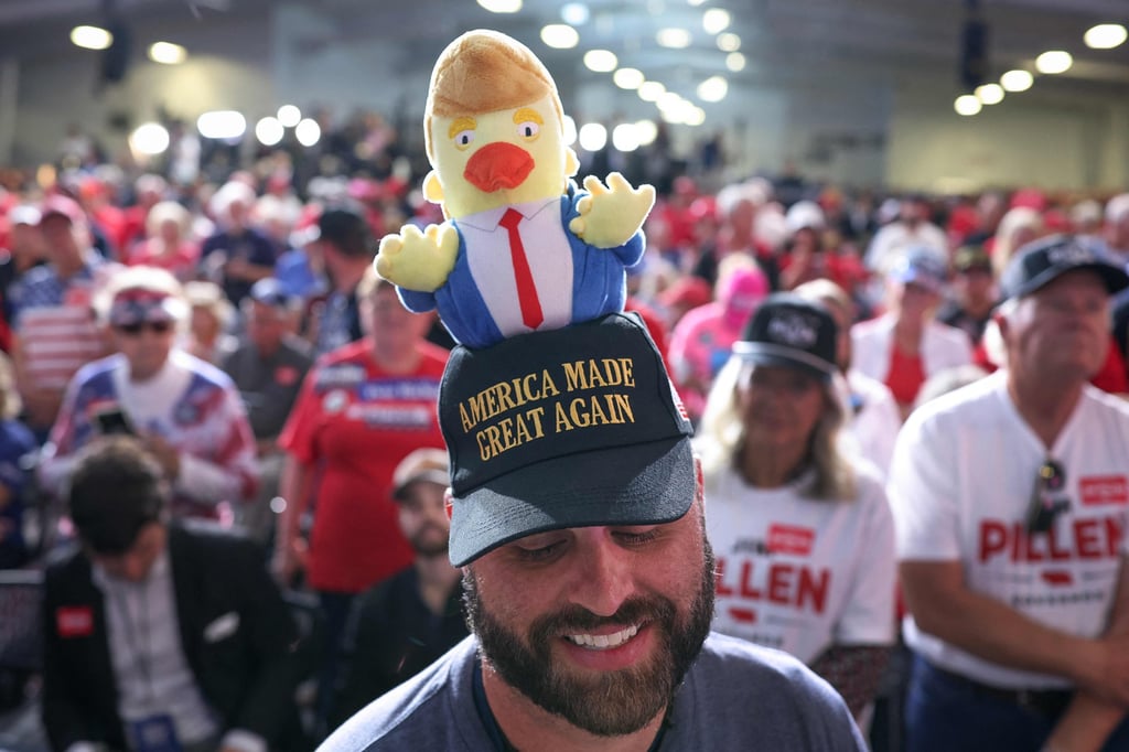 Guests listen as US President Donald Trump speaks during a campaign rally in Grand Island, Nebraska, on Monday. Photo: AFP