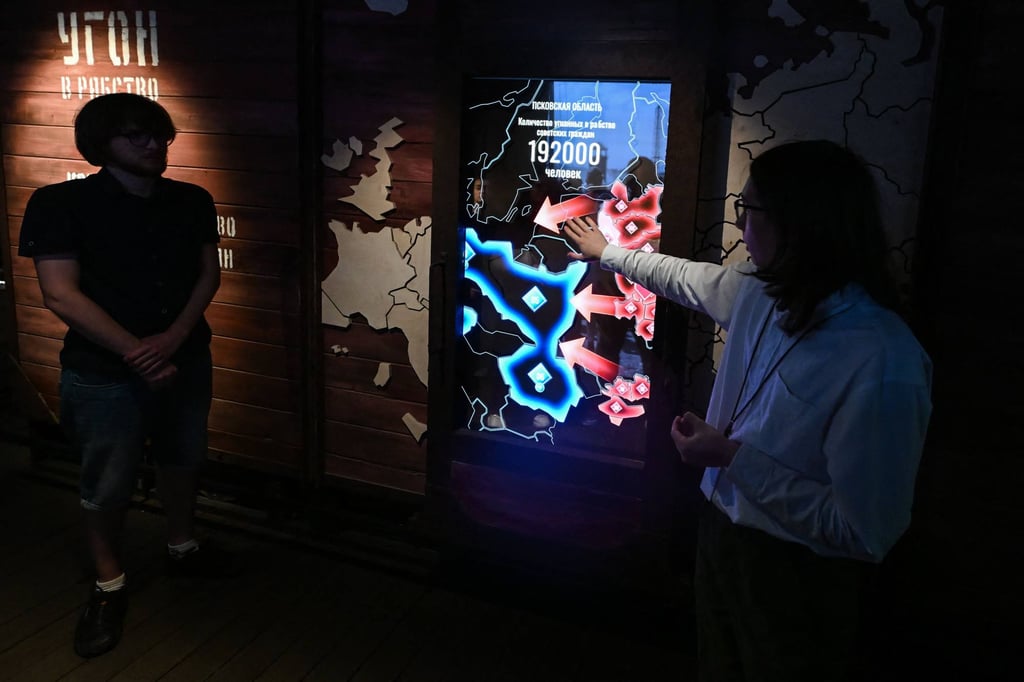 Visitors attend a guided tour at the Museum of Memory in Moscow in August. The museum offers only guided tours to small groups by prior arrangement. Photo: AFP