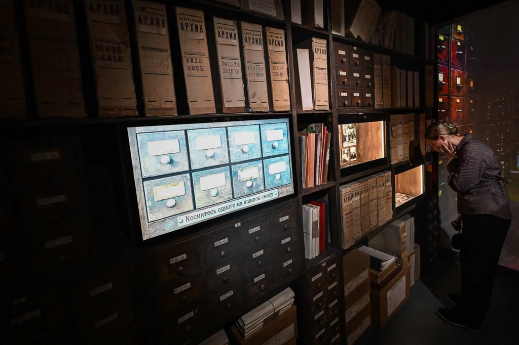 Visitors attend a guided tour at the Museum of Memory, dedicated to the “genocide of the Soviet people” during the Great Patriotic War (World War II), in Moscow in August. Photo: AFP